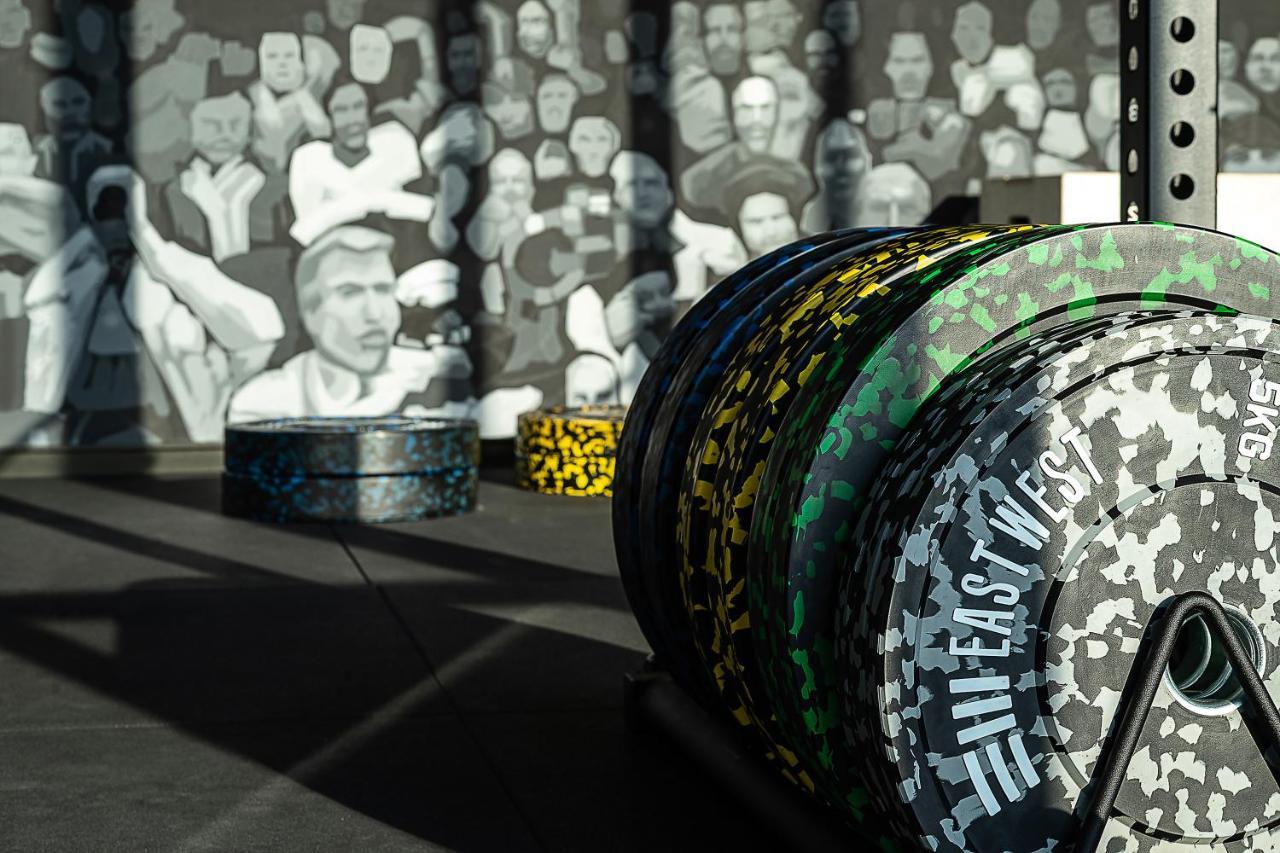 Silq Hotel & Residence, Managed By The Ascott Limited Бангкок Экстерьер фото A 2015 Formula One car with a green and yellow halo