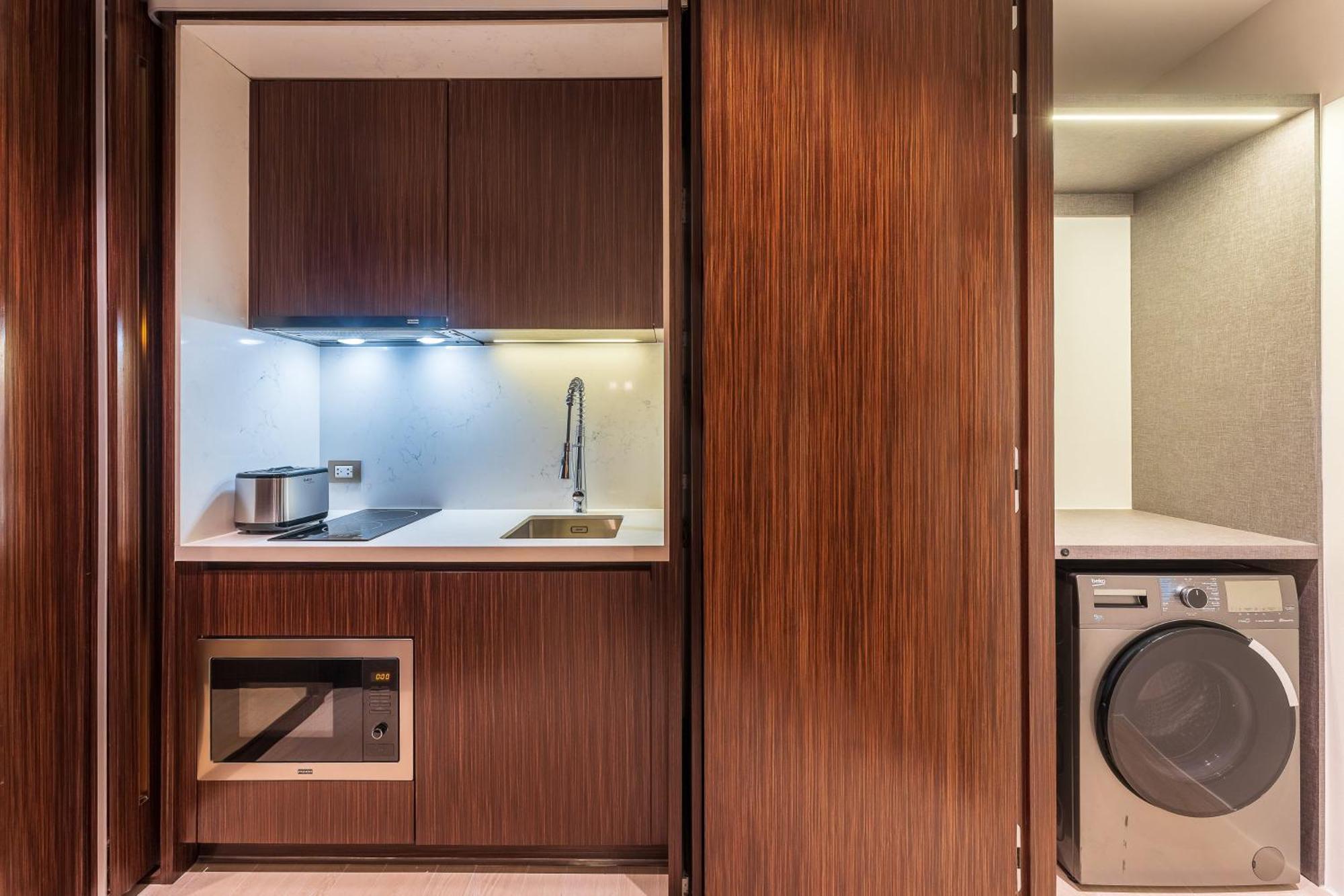 Silq Hotel & Residence, Managed By The Ascott Limited Бангкок Номер фото A kitchen in a serviced apartment